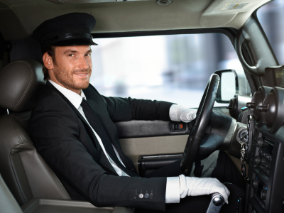 A man sitting in the driver's seat of a truck