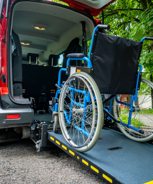 A wheelchair attached to the back of a van