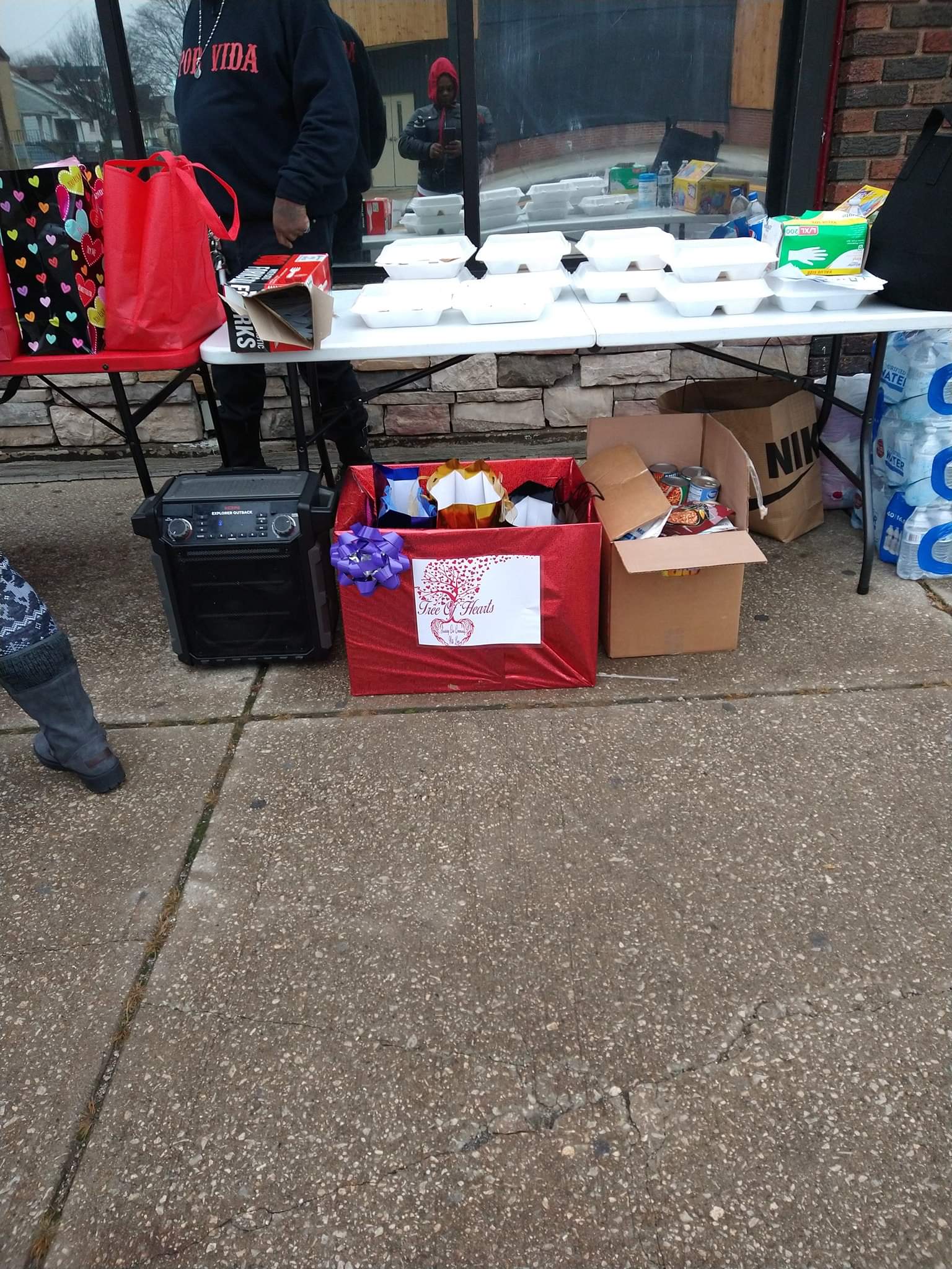 A table that has a bunch of boxes on it